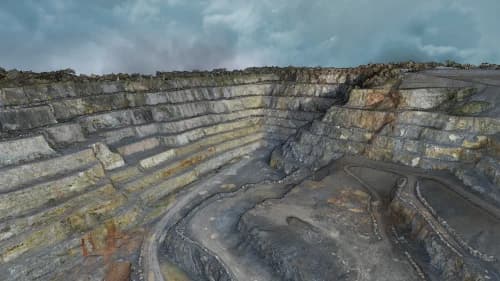 Vue aérienne de 200 hectares modélisés en 3D par photogrammétrie avec un drone DJI Mavic 3E RTK, idéal pour l’analyse des sites miniers et carrières.